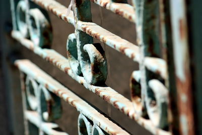 Close-up of rusty metal gate