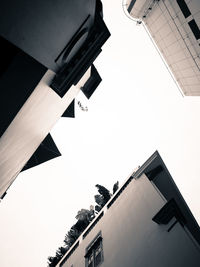 Low angle view of buildings against clear sky