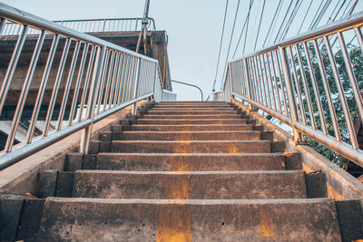 Low angle view of steps and building against sky