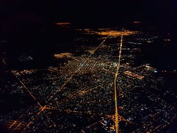 Aerial view of illuminated fireworks against sky at night