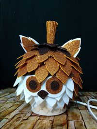 Close-up of cake on table against black background