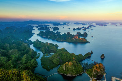 High angle view of sea against sky during sunset