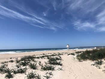 Scenic view of beach against sky