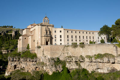 View of historical building against clear blue sky