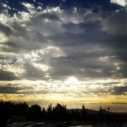 Scenic view of landscape against cloudy sky