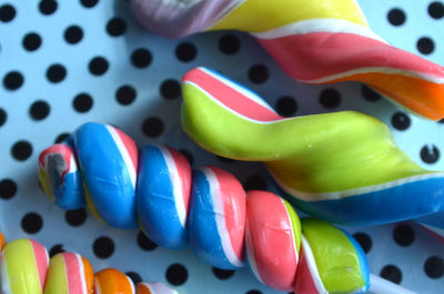 Close-up of multi colored candies on table