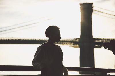 Woman standing against sky