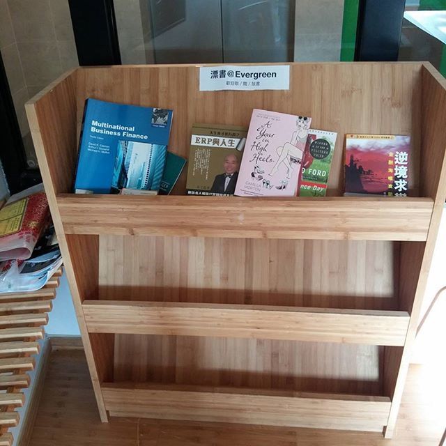 indoors, text, book, western script, wood - material, education, communication, shelf, table, built structure, architecture, no people, arrangement, large group of objects, in a row, high angle view, empty, variation, wooden, day