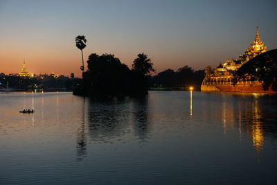 View of illuminated building at sunset