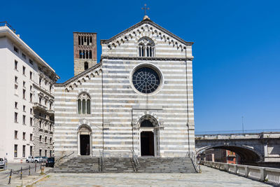 Low angle view of church against clear blue sky