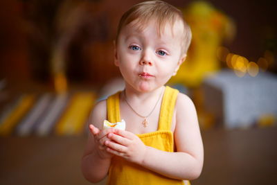 Easter baby eats an egg