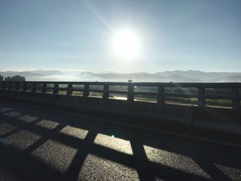 Scenic view of mountains against sky on sunny day