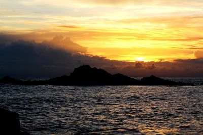 Scenic view of sea against sky during sunset