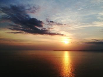 Scenic view of sea at sunset