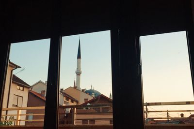 Low angle view of buildings against sky during sunset