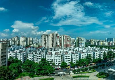 Buildings in city against sky