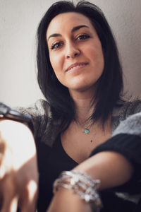 Portrait of smiling young woman