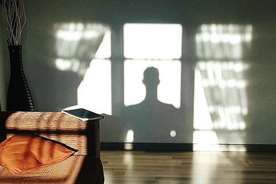 Reflection of man on window