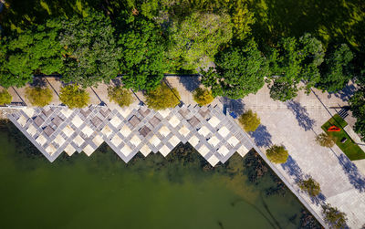 High angle view of swimming pool by lake