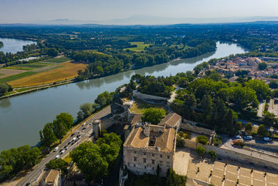 High angle view of river amidst buildings in city