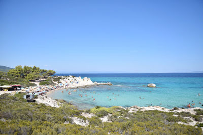 Scenic view of sea against clear blue sky