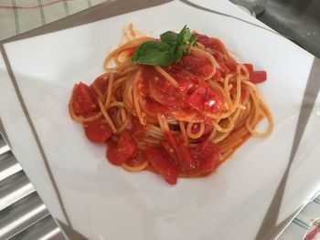 High angle view of pasta in plate on table