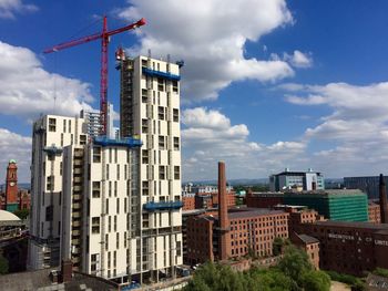 Construction site with buildings in background