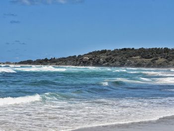 Scenic view of sea against clear blue sky