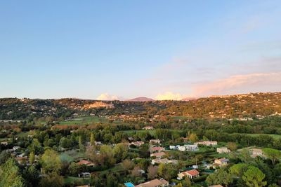 Aerial view of townscape against sky
