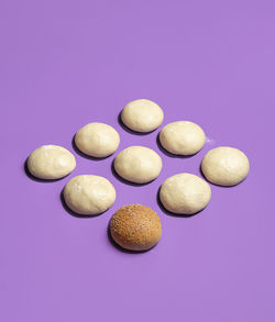 High angle view of candies against blue background