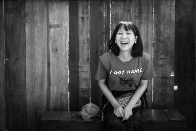 Portrait of smiling young woman outdoors