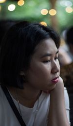 Close-up portrait of a girl looking away