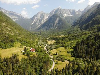 Scenic view of landscape and mountains against sky