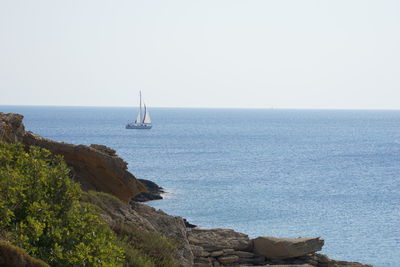 Scenic view of sea against clear sky