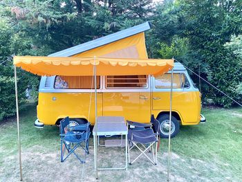 View of yellow cart on field