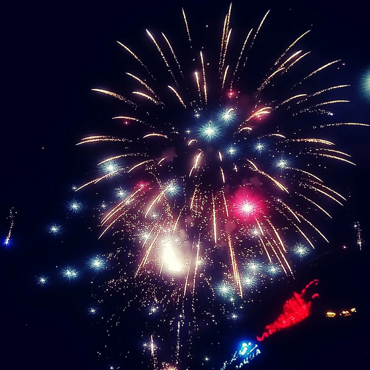 firework display, night, celebration, illuminated, exploding, firework - man made object, long exposure, arts culture and entertainment, event, low angle view, motion, firework, glowing, entertainment, multi colored, sparks, sky, blurred motion, celebration event, outdoors