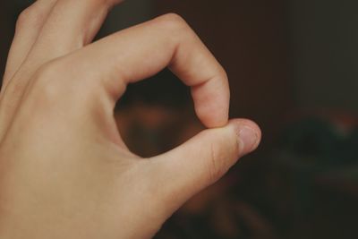 Close-up of hand holding hands