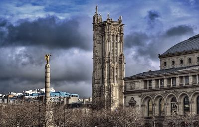 View of clock tower against cloudy sky