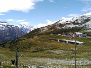 Scenic view of snowcapped mountains against sky