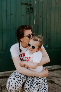 Happy girl sitting at home