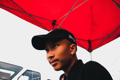 Portrait of young man looking away