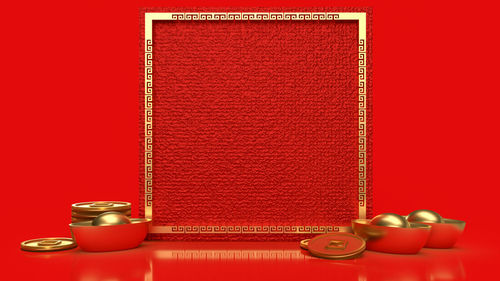 Close-up of electric lamp on red table