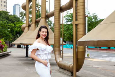 Beautiful young woman at the jairo varela square in the center of the city of cali in colombia