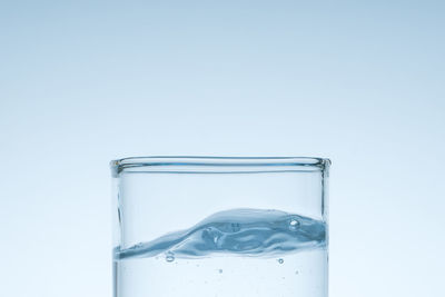 Close-up of glass against white background