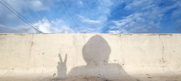 Shadow of person on wall