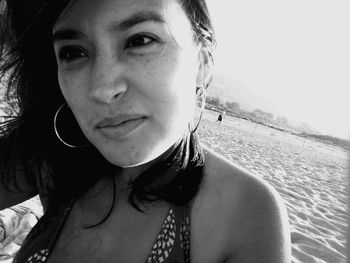 Portrait of young woman on beach