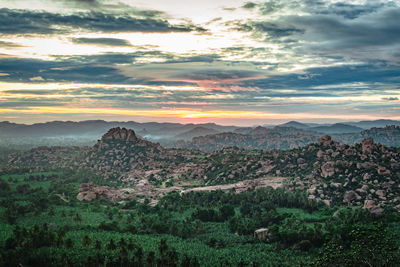 Scenic view of landscape against sky during sunset