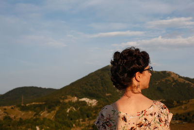 A woman watches the sunset in croatia