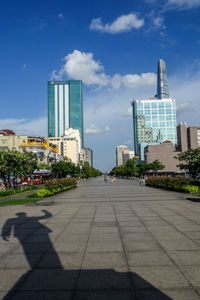 Modern buildings in city against sky