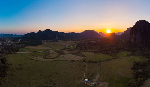 High angle view of landscape against sky during sunset